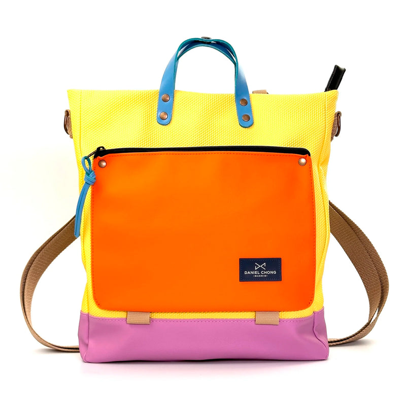 Bolso-mochila Worker Bag de Daniel Chong - Amarillo con bolsillo naranja
