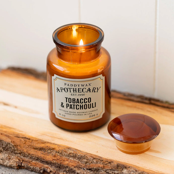 Vela en frasco de botica Paddywax - Tabaco y patchouli