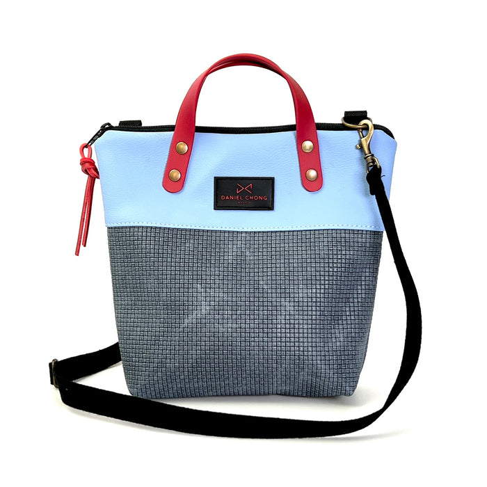 Bandolera mini impermeable con asas vegano Daniel Chong - Asas rojo cuerpo azul y gris