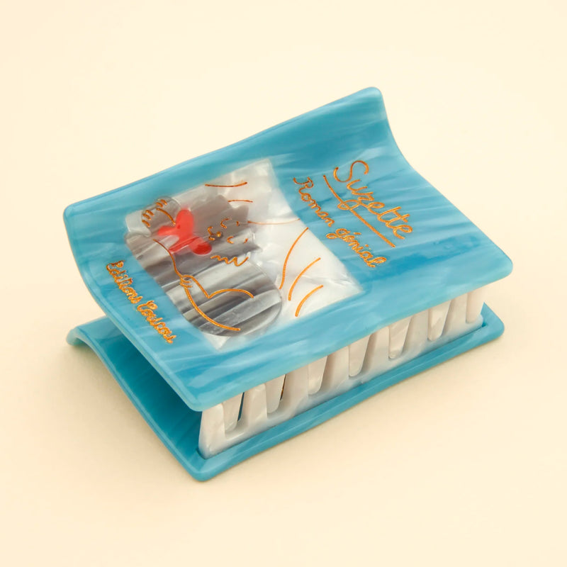 Pinza para el pelo - Libro 📖