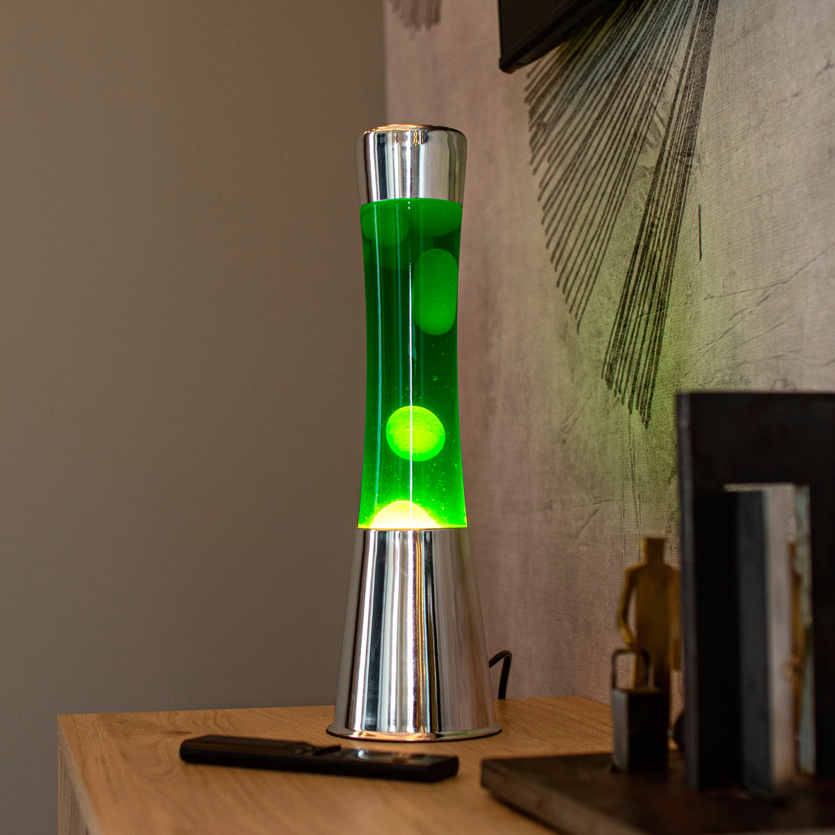 Lámpara de lava Fisura - Base cromo, líquido verde y lava amarilla