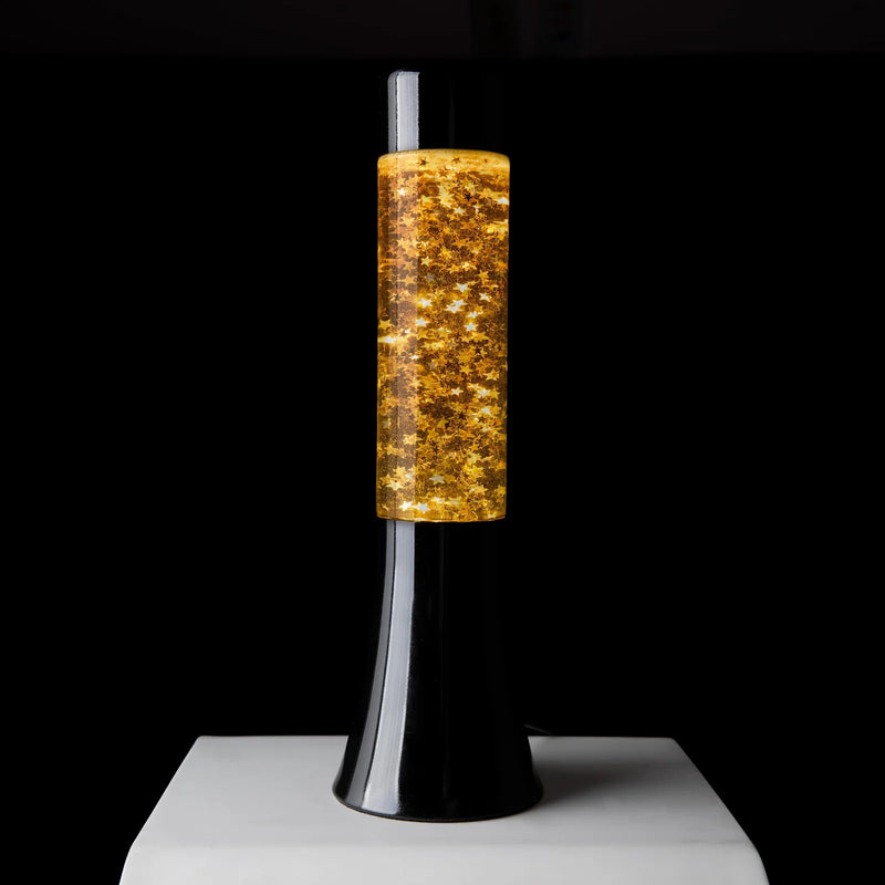 Lámpara de lava mini Fisura - Base negra, líquido amarillo y glitter de estrellas
