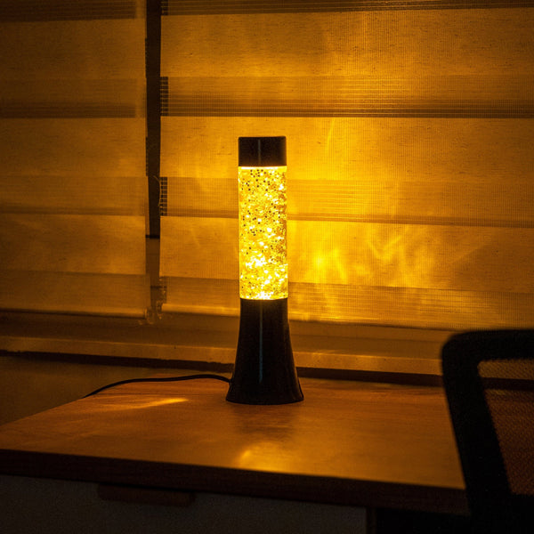 Lámpara de lava mini - Base negra, líquido amarillo y glitter de estrellas