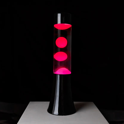 Lámpara de lava mini Fisura - Base negra, líquido transparente y lava rosa