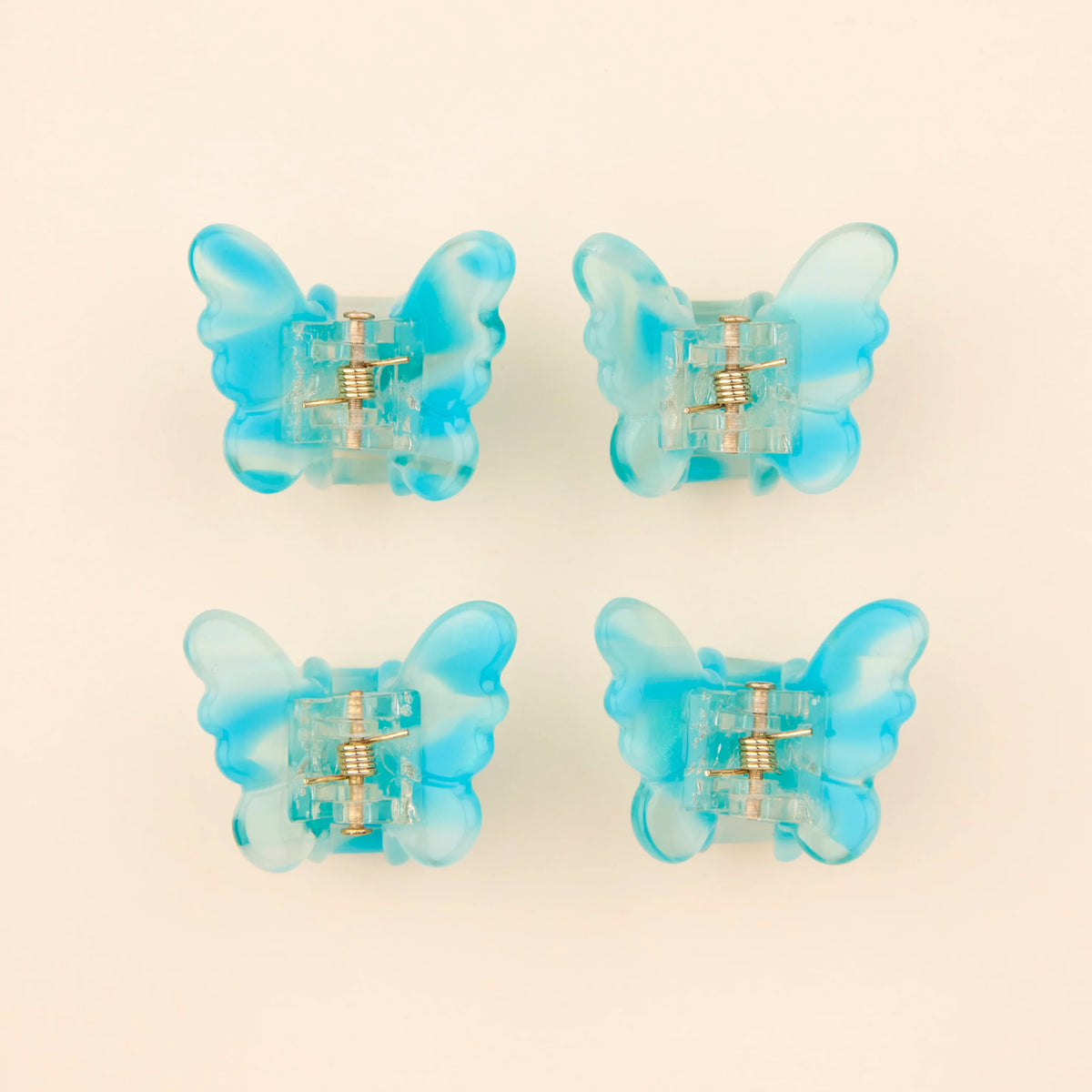Set de 4 minipinzas - Mariposas