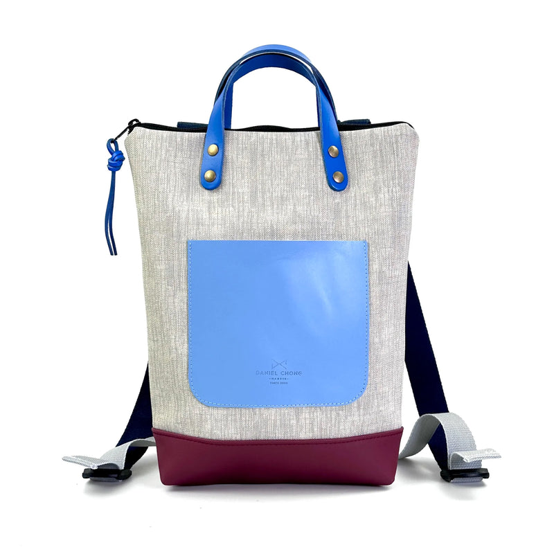Mochila Mini Impermeable con bolsillo extra Daniel Chong - Gris con bolsillo azul