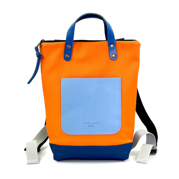 Mochila Mini Impermeable con bolsillo extra Daniel Chong - Naranja con bolsillo azul