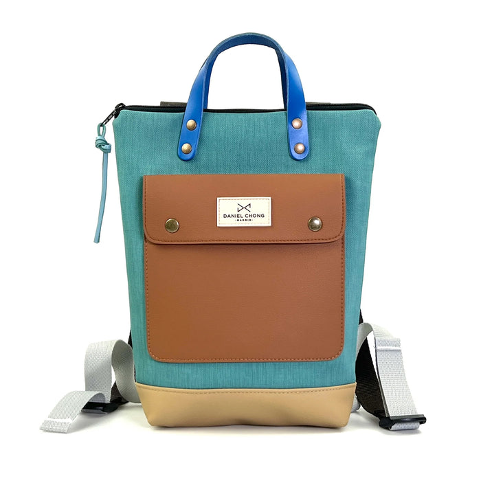 Mochila Mini Solapa con bolsillo extra Daniel Chong - Turquesa con bolsillo marrón