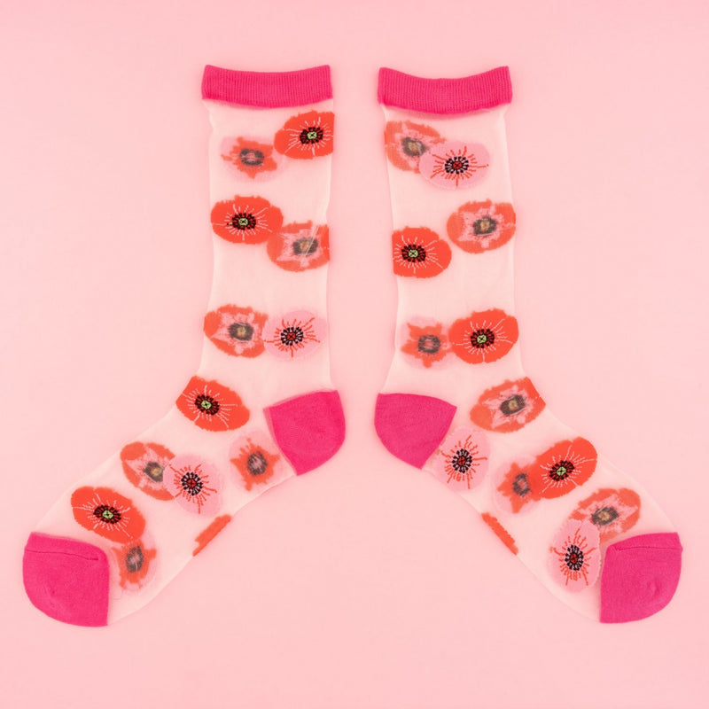 Calcetines de malla transparente con dibujos de amapolas rojas y rosadas. Divertidos calcetines de algodón, poliéster y spandex.