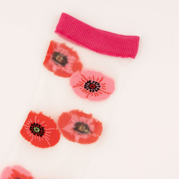 Calcetines de malla transparente con dibujos de amapolas rojas y rosadas. Divertidos calcetines de algodón, poliéster y spandex.