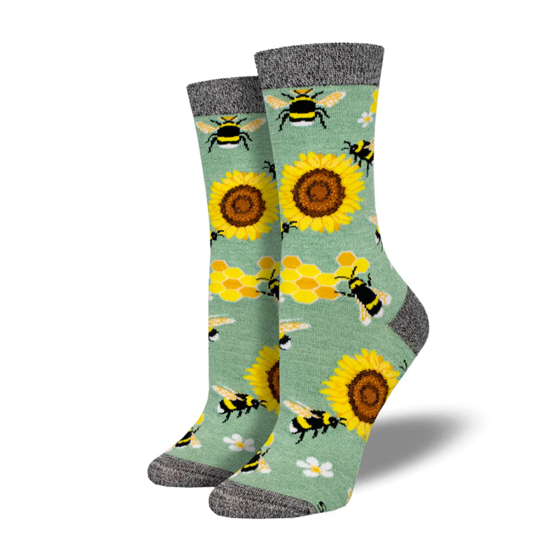  Calcetines de media caña de fondo verde agua estampado con abejas, girasoles, margaritas y panales. Calcetines estampados con abejas y flores con puntera, remate y talón en color gris.