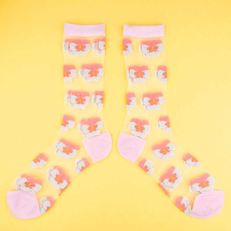 Calcetines de malla transparentes con dibujos de pensamientos rosa. Calcetines con estampado de pensamientos con el remate, el talón y la punta en rosa palo.